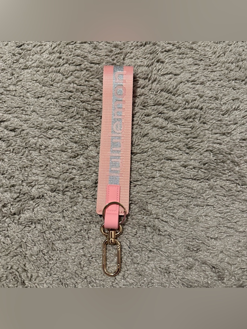 Lululemon pink wristlet key and card holder with gold hardware